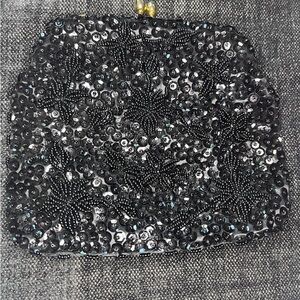 1960s Vintage hand-beaded black sequin and bead bag, gold metal handle.